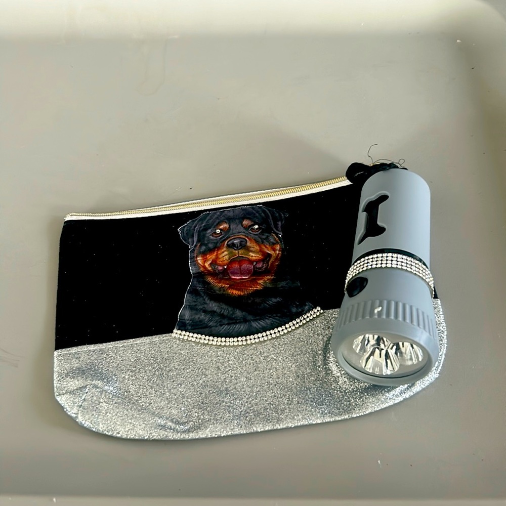 Customize bag with poo dispenser and flashlight. Carry your furry babies treats